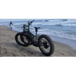 Трехколесный велосипед, который создан, чтобы ездить по песку.
